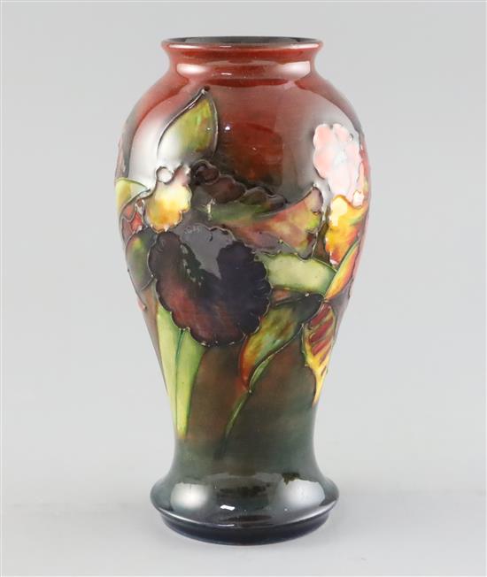 A Moorcroft orchid flambe baluster vase, 1950s, H.22cm
